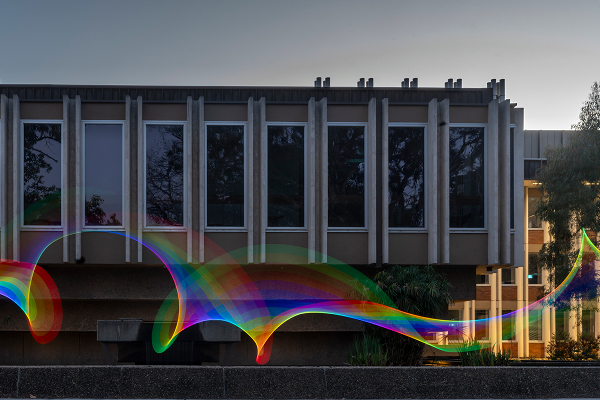 Birch building with rainbow