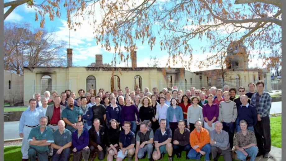 Observatory staff gather following 2003 fires (Mt Stromlo Archives)